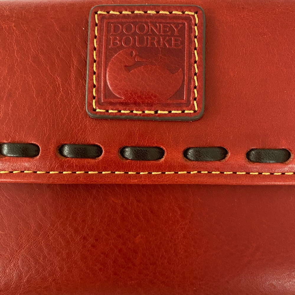 Beautiful Dooney Florentine Continental Cluth